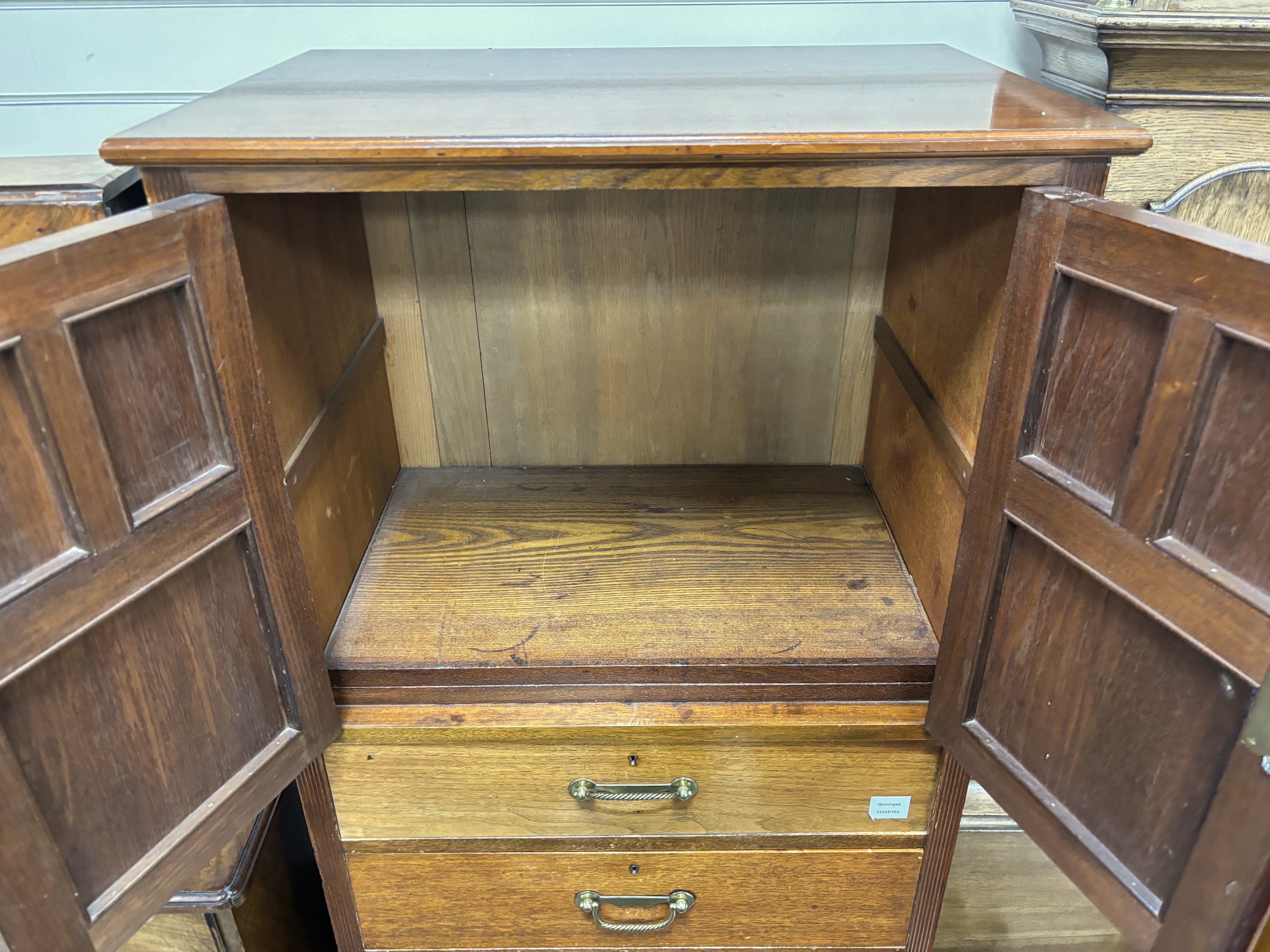 An Arts & Crafts mahogany cupboard, width 70cm, depth 49cm, height 146cm